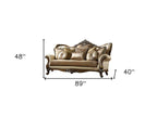 89" Tan Polyester Blend Curved Floral Sofa And Toss Pillows With Brown Legs