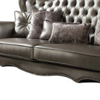 46" Platinum Faux Leather Curved Sofa And Toss Pillows