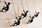 Set of Five Black Resin Climbing Man Hanging Dimensional Sculpture