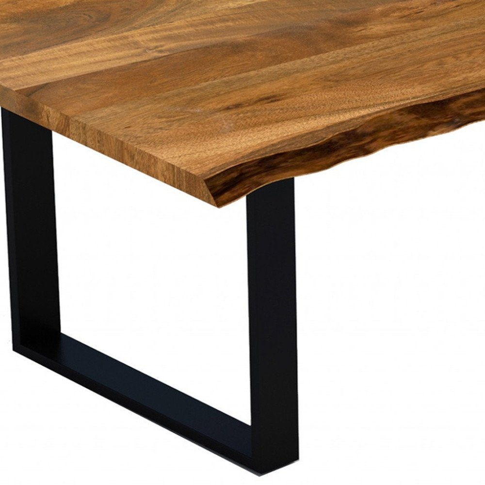 63" Brown And Black Solid Wood Sled Base Dining Table