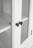 57" White Solid Wood Three Drawer Sideboard with Four Glass Doors