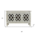 58" White Distressed Solid Wood Carved Scrollwork Sideboard with Three Glass Doors
