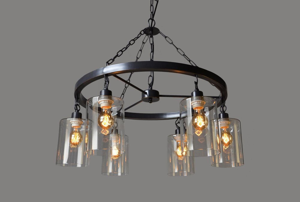 Black Shaded Six Light Metal and Transparent Glass Chandelier With Clear Shades