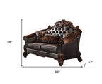 66" Brown And Dark Brown Chenille And Faux Leather Loveseat and Toss Pillows