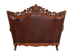 69" Brown And Walnut Top Grain Leather Curved Loveseat and Toss Pillows