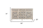 66" White Distressed Solid Wood Carved Floral Six Drawer Sideboard With Two Doors