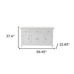 59" White Solid Wood Paneled Three Drawer Buffet Table with Four Doors