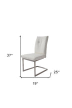 Set of Two White And Silver Tufted Faux Leather And Stainless Steel Dining Side Chairs