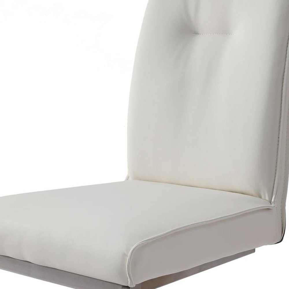 Set of Two White And Silver Tufted Faux Leather And Stainless Steel Dining Side Chairs