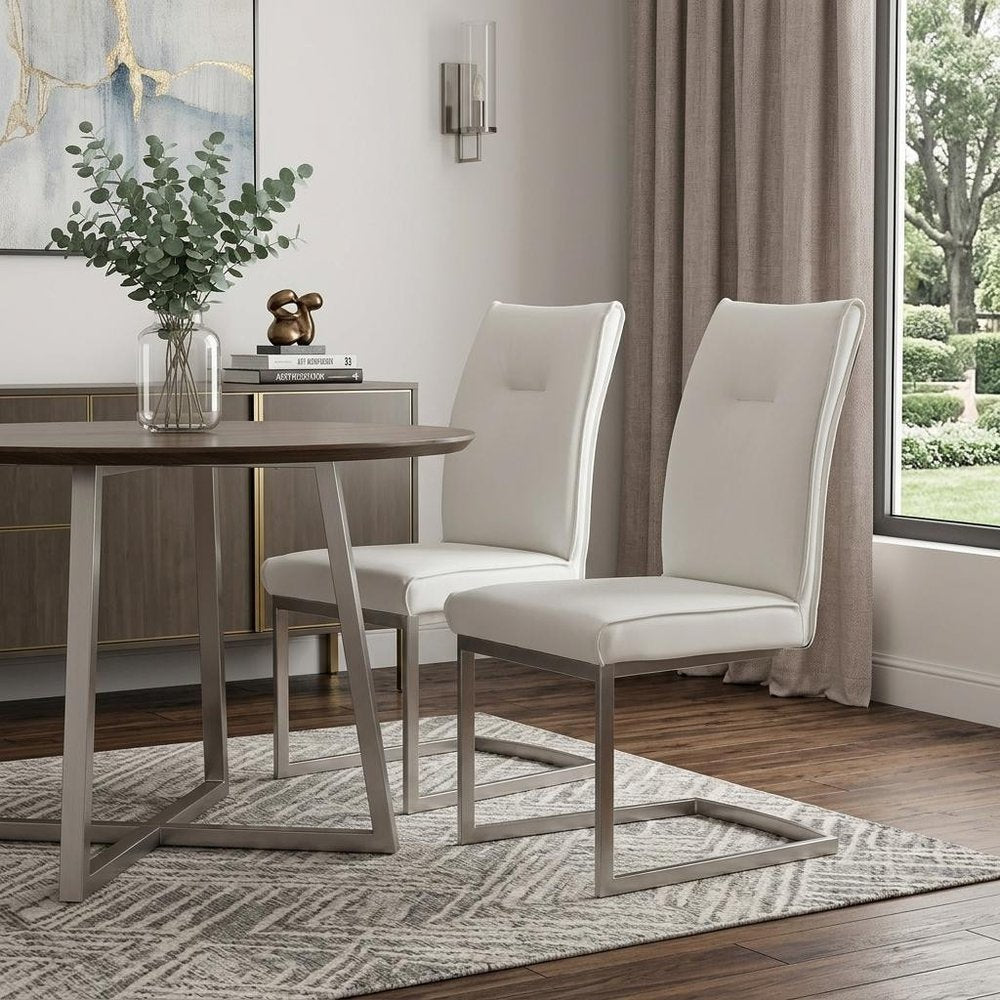 Set of Two White And Silver Tufted Faux Leather And Stainless Steel Dining Side Chairs