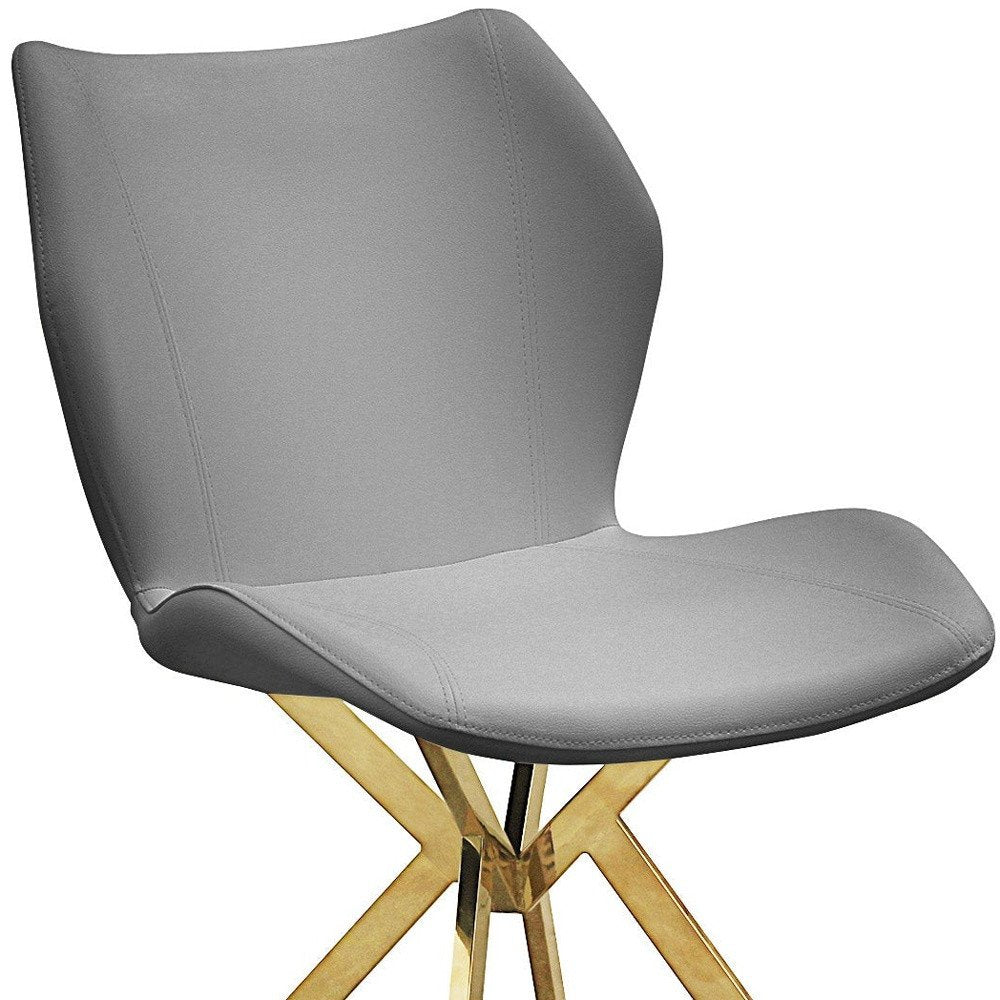 Set of Four Gray And Gold Faux Leather And Metal Dining Side Chairs
