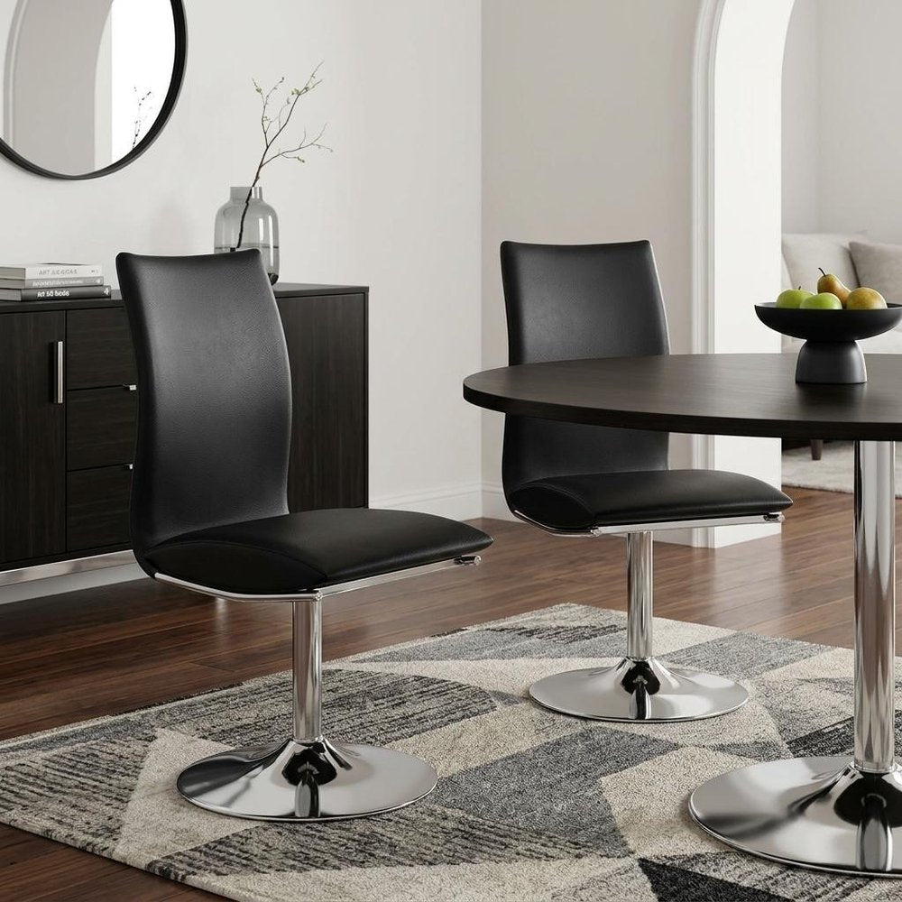 Set of Two Black And Silver Faux Leather And Metal Swivel Dining Side Chairs