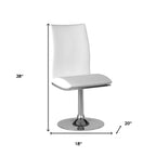 Set of Two Black And Silver Faux Leather And Metal Swivel Dining Side Chairs