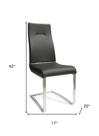 Set of Two Black And Silver Faux Leather And Stainless Steel Dining Side Chairs