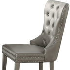 Set of Two Champagne Tufted Faux Leather And Solid Wood Wing Back Dining Side Chairs