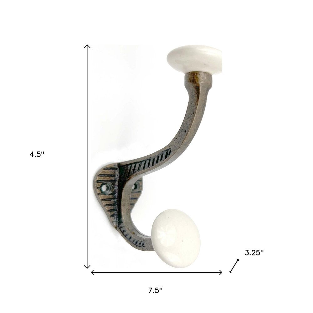 Set of Six Bronze And White Cast Iron And Ceramic Double Wall Hooks