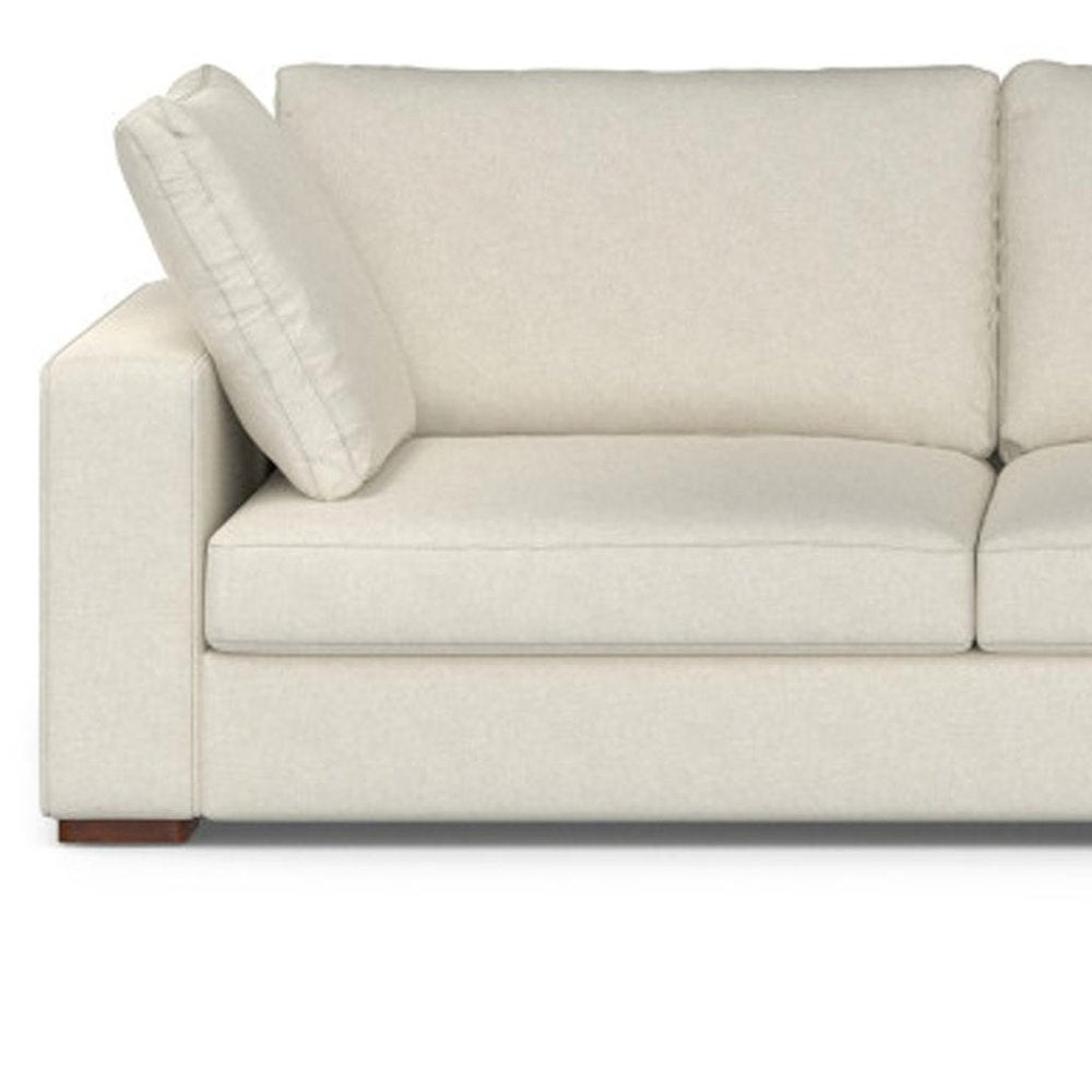 122" Cream Upholstered Right Chaise Style Sofa With Toss Pillows
