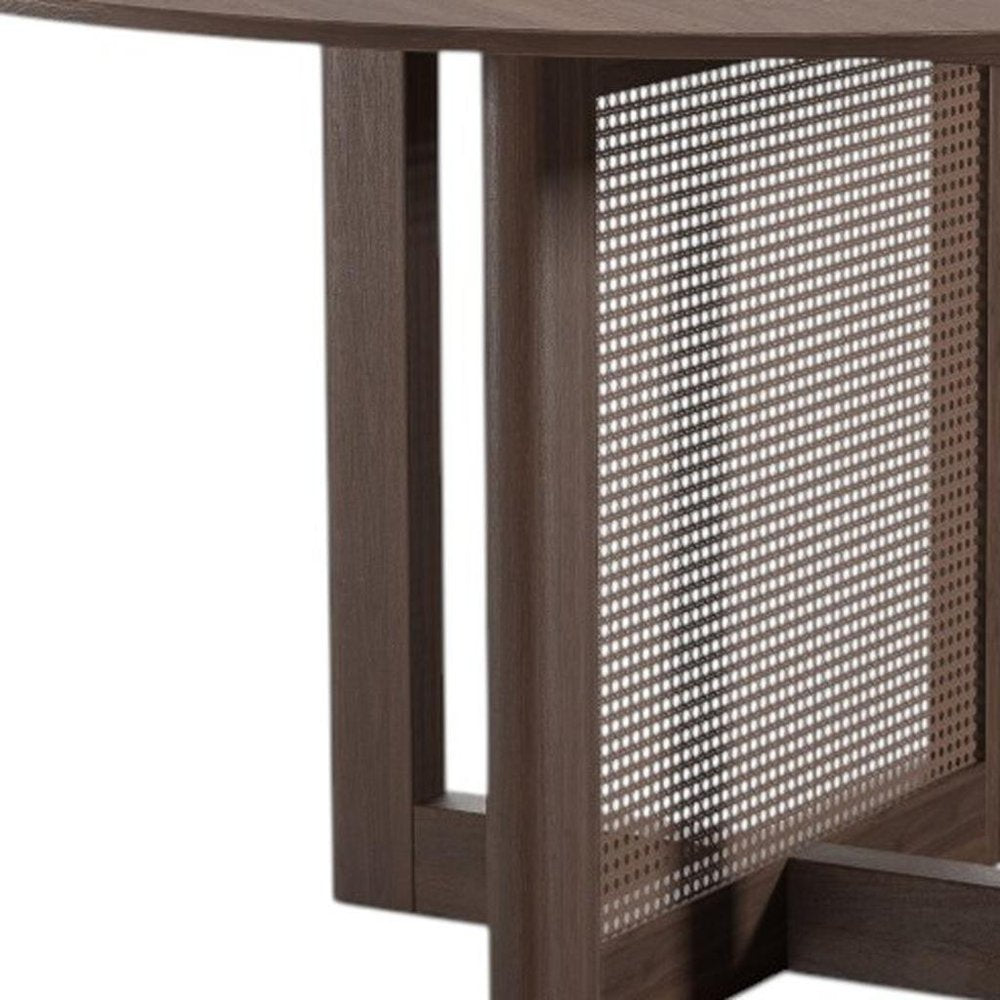 52" Brown Solid Wood and Rattan Cross Leg Base Round Top Dining Table