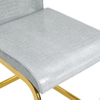 Set of Four Gray And Silver Tufted Faux Leather And Metal Dining Side Chairs