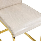 Set of Four Beige And Silver Tufted Faux Leather And Metal Dining Side Chairs