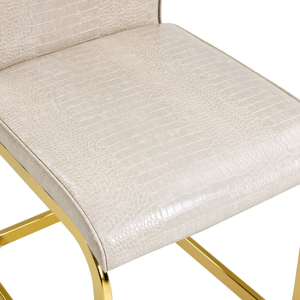 Set of Four Beige And Silver Tufted Faux Leather And Metal Dining Side Chairs