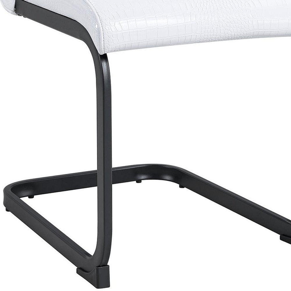 Set of Four White And Silver Tufted Faux Leather And Metal Dining Side Chairs
