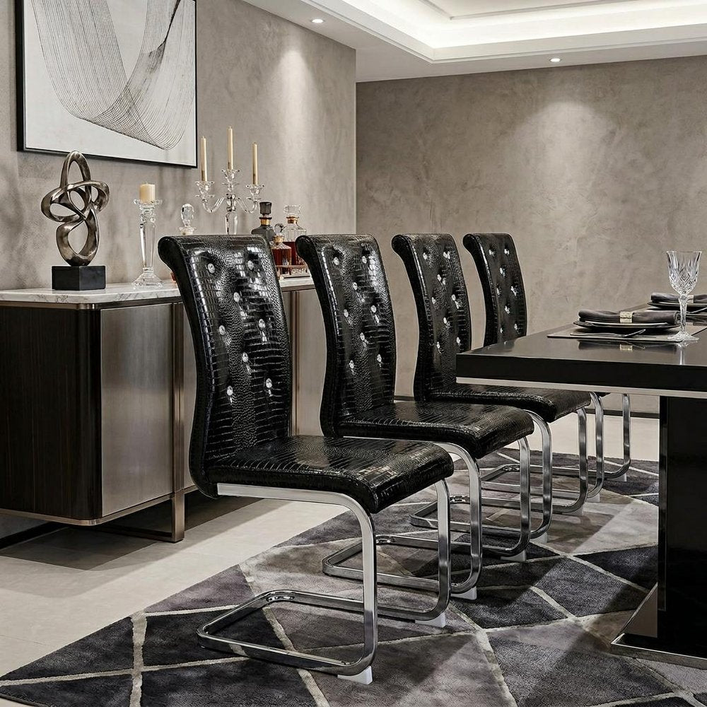 Set of Four Black And Silver Tufted Faux Leather And Metal Dining Side Chairs