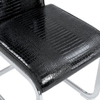 Set of Four Black And Silver Tufted Faux Leather And Metal Dining Side Chairs