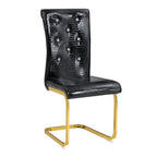 Set of Four Black And Silver Tufted Faux Leather And Metal Dining Side Chairs