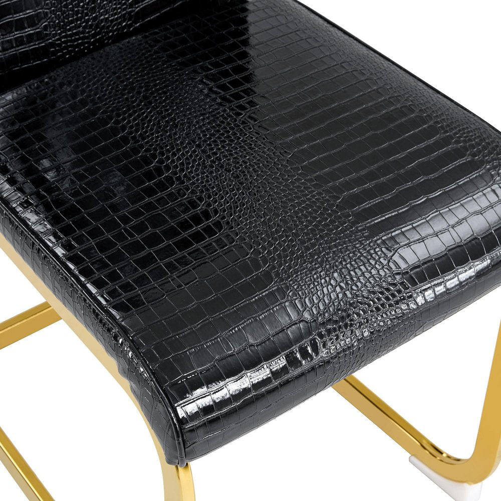 Set of Four Black And Silver Tufted Faux Leather And Metal Dining Side Chairs