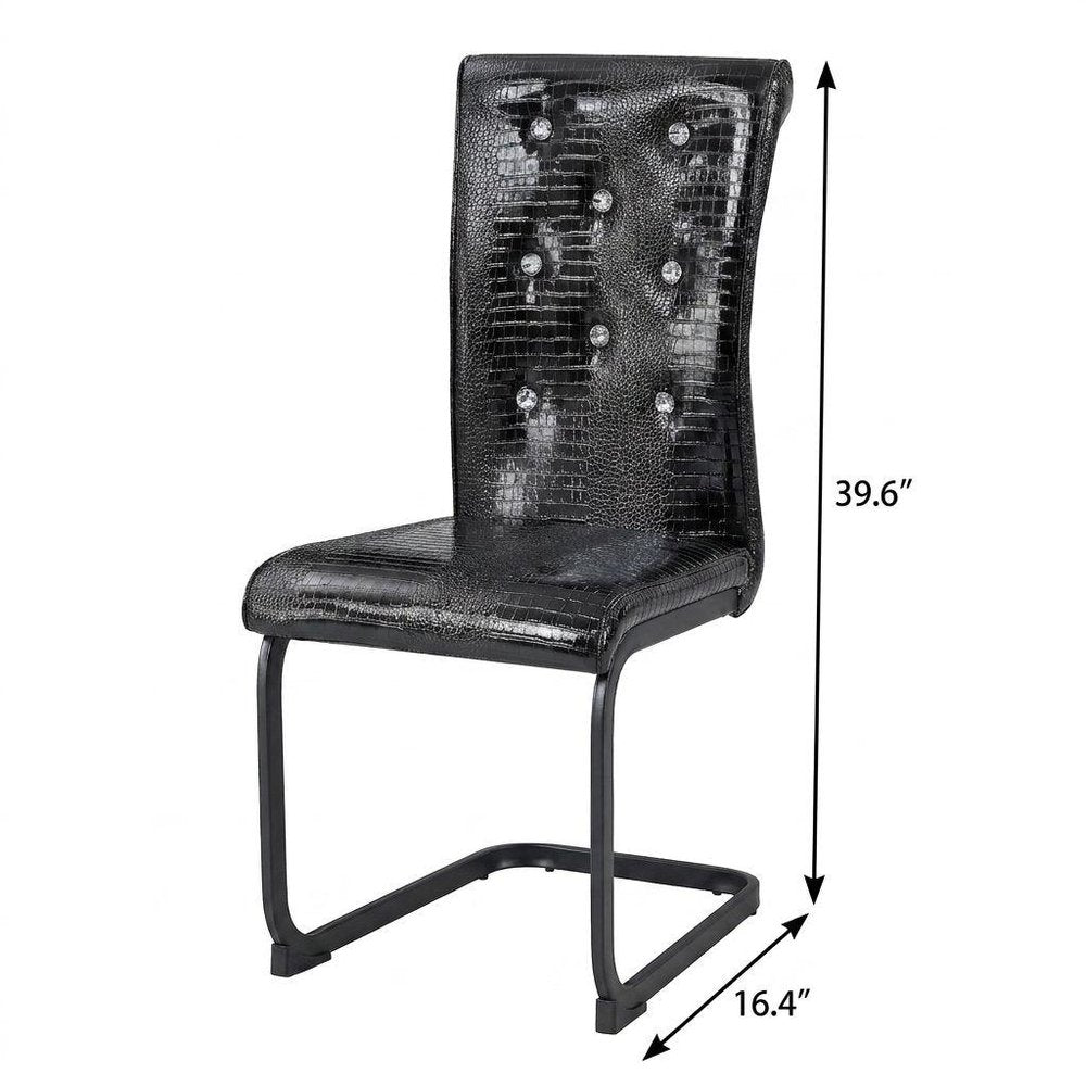 Set of Four Black And Silver Tufted Faux Leather And Metal Dining Side Chairs