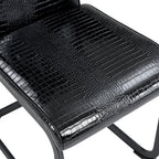 Set of Four Black And Silver Tufted Faux Leather And Metal Dining Side Chairs