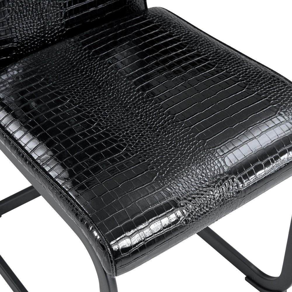 Set of Four Black And Silver Tufted Faux Leather And Metal Dining Side Chairs
