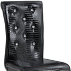 Set of Four Black And Silver Tufted Faux Leather And Metal Dining Side Chairs