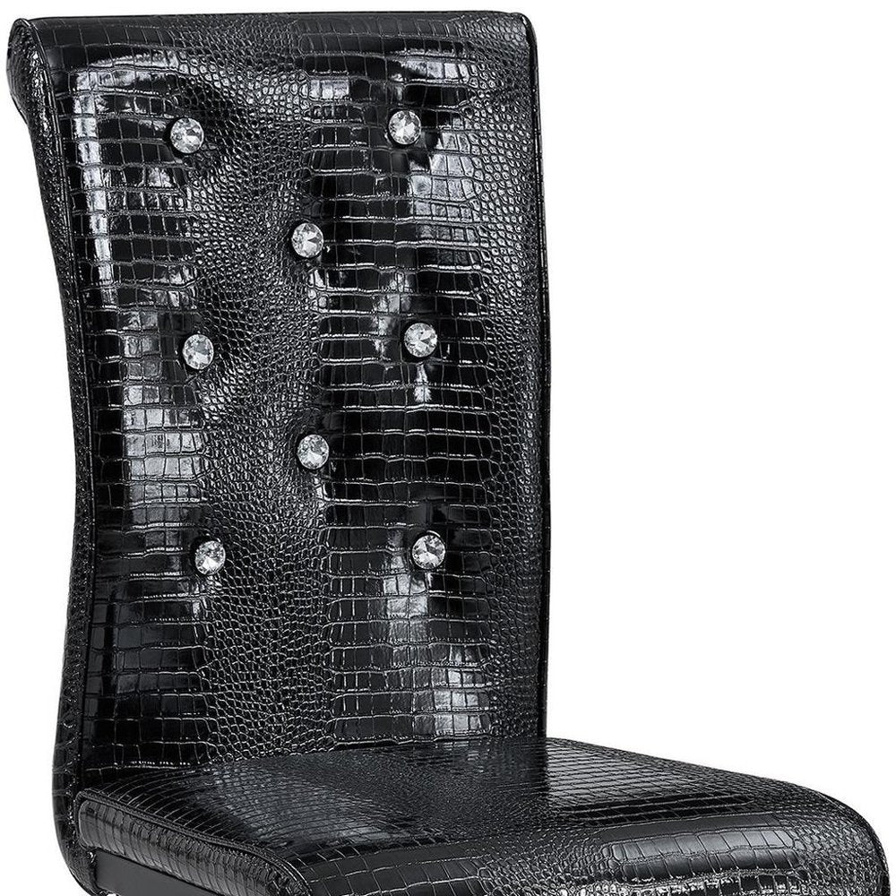 Set of Four Black And Silver Tufted Faux Leather And Metal Dining Side Chairs