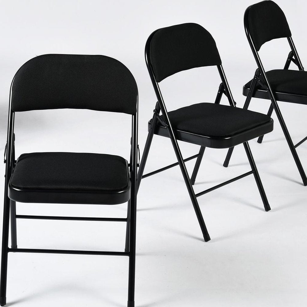 Set of Four Black Faux Leather and Steel Folding Chairs