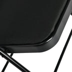 Set of Four Black Faux Leather and Steel Folding Chairs