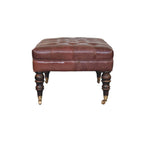 35" Brown And Brass Rolling Genuine Leather Tufted Ottoman