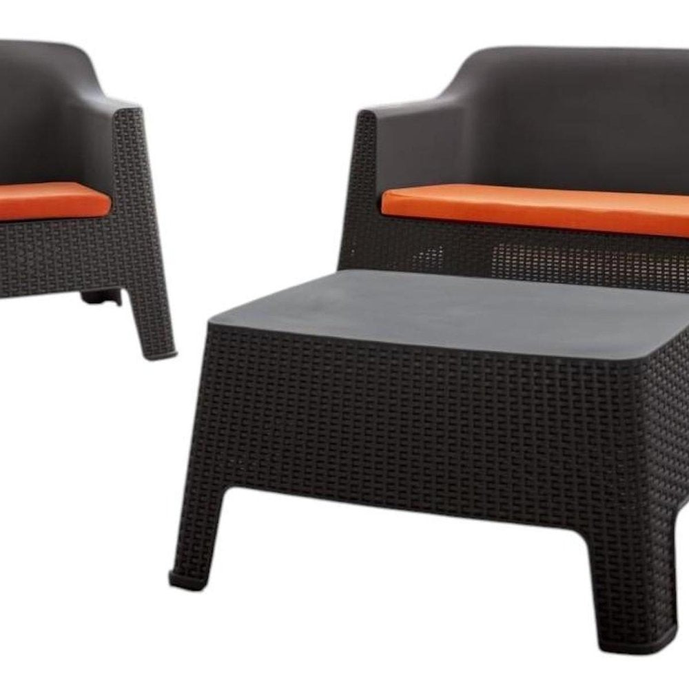 Four Piece Espresso and Beige Plastic Upholstered Cushions Outdoor Patio Set With Table