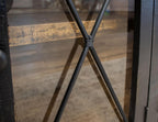 71" Black Distressed Wood Three Drawer Credenza With Four Glass Doors